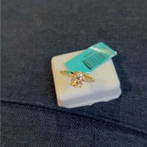 Elegant Gold and Silver Ring with Clear Gemstone